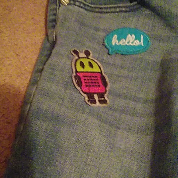 Blue denim jeans with little decorations on them - Picture 4 of 5